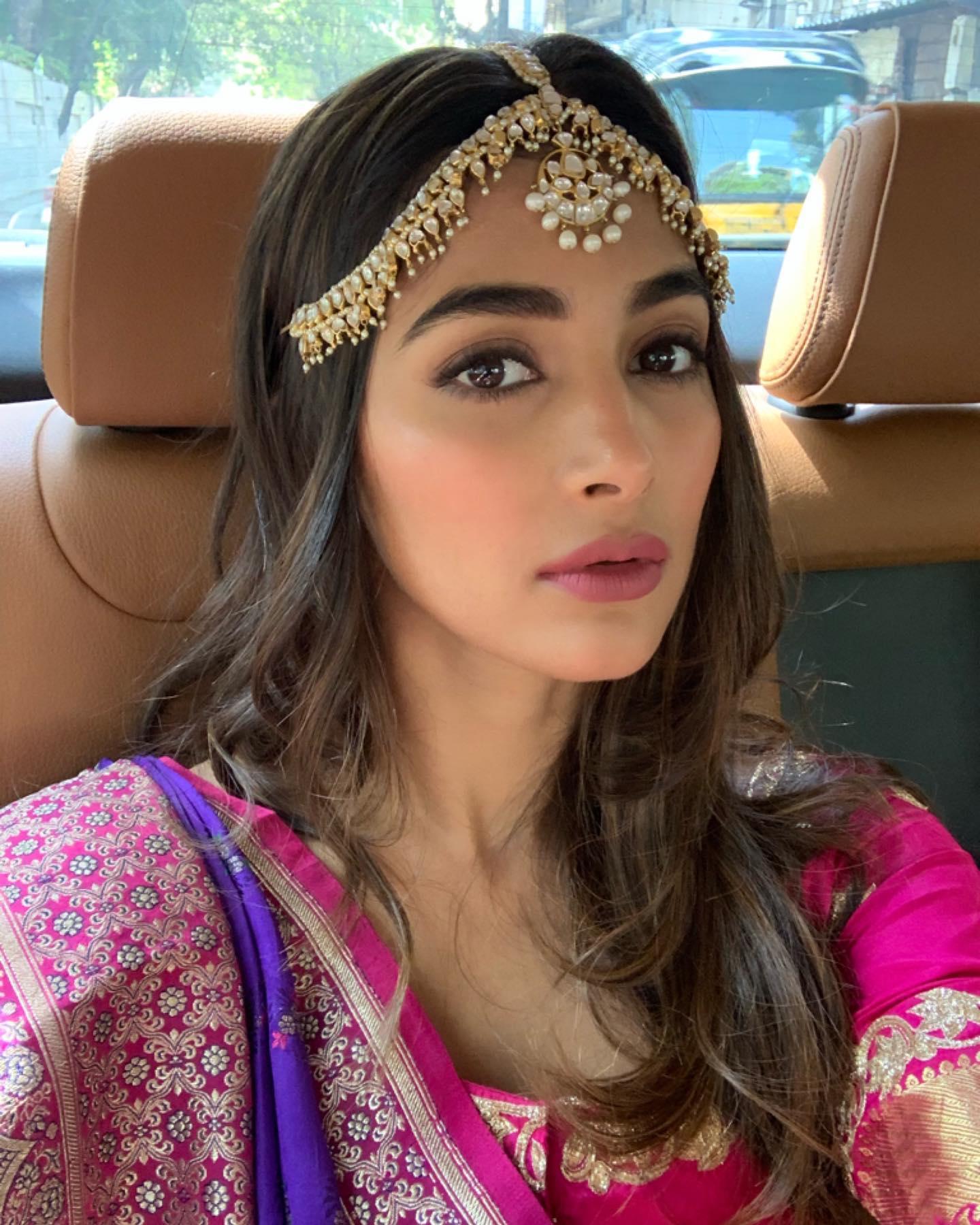 Pooja Hegde in Car Wearing Purple Ethnic Attire Wallpaper