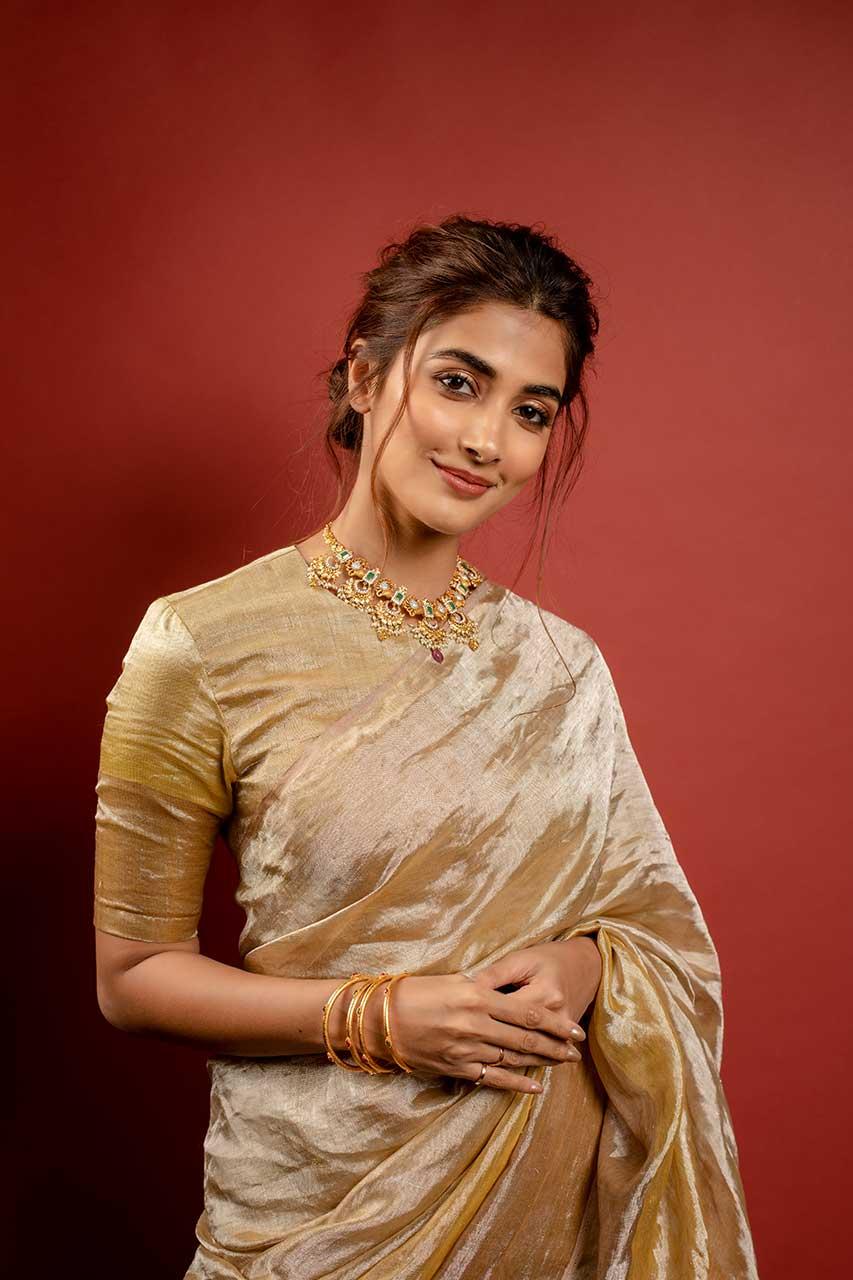 Pooja Hegde in Elegant Gold Saree At Cultural Event
