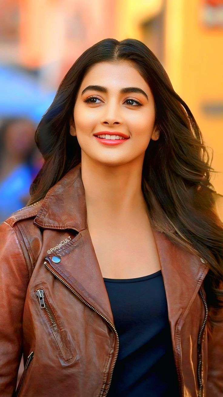Pooja Hegde in Leather Jacket Smiling Outdoorswallpaper