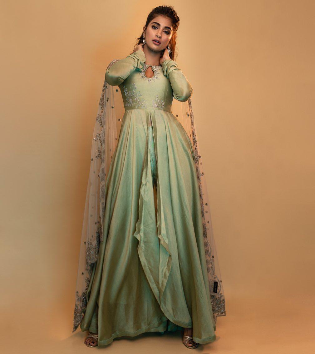 Pooja Hegde in Mint Green Gown with Cape Sleeves and Charm