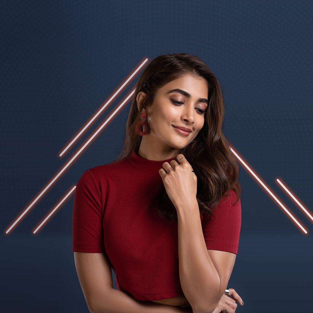 Pooja Hegde in Modern Red Top with Creative Background