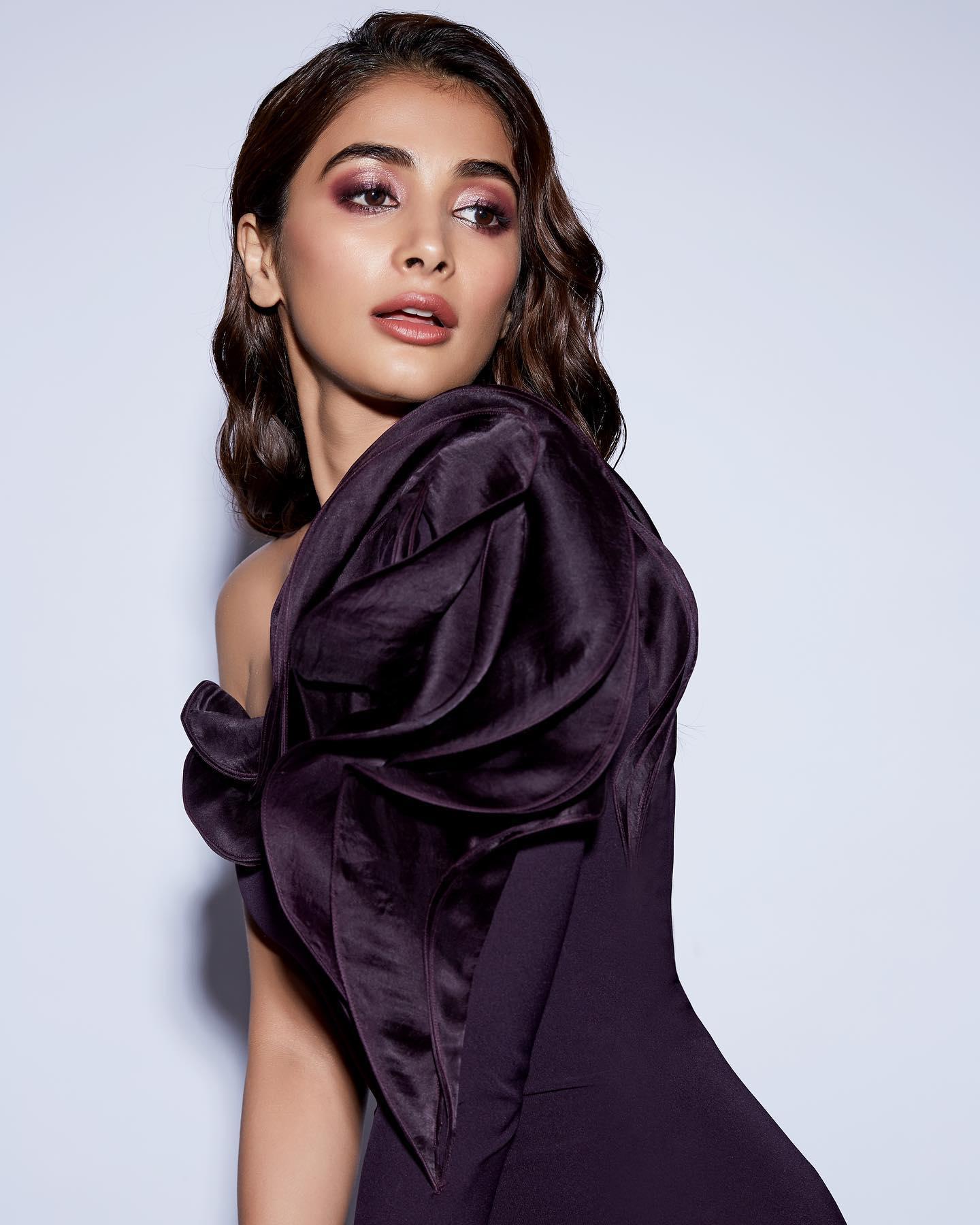 Pooja Hegde in Off Shoulder Black Dress Looking Aside