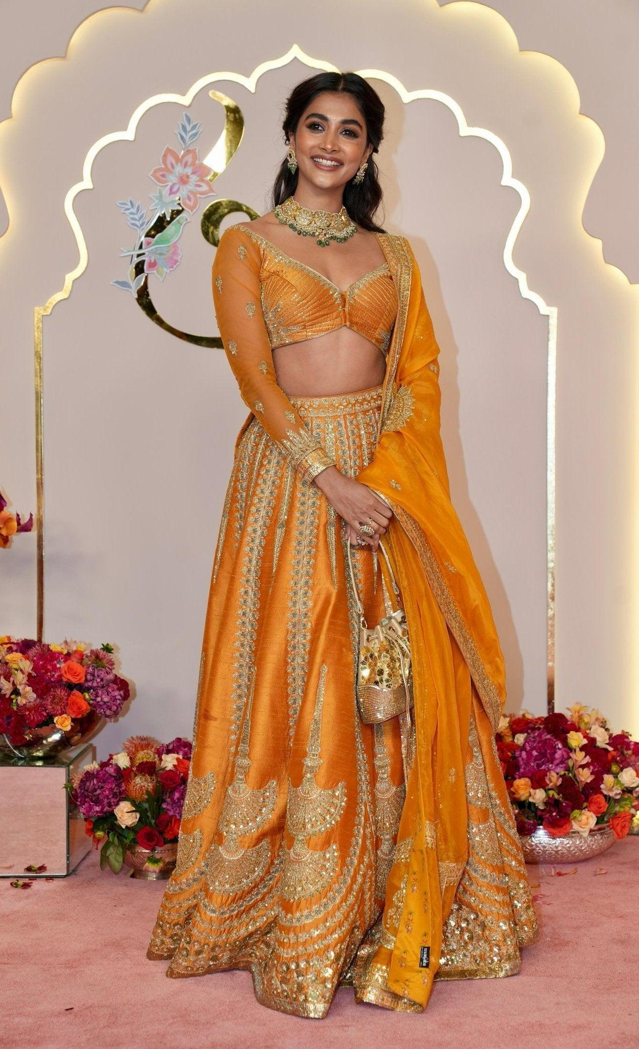 Pooja Hegde in Orange Traditional Dress At An Event Image