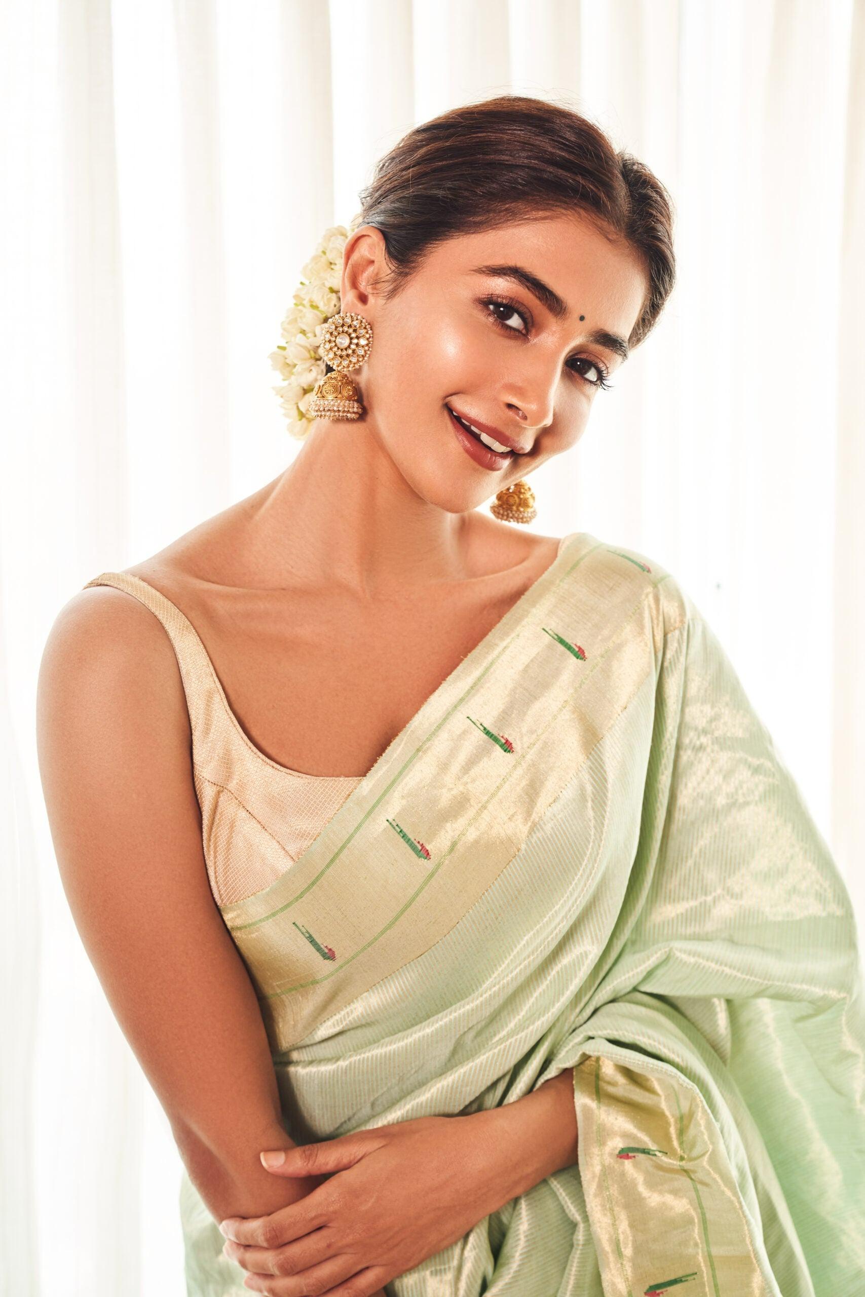 Pooja Hegde in Pastel Green Saree with Elegant Bun