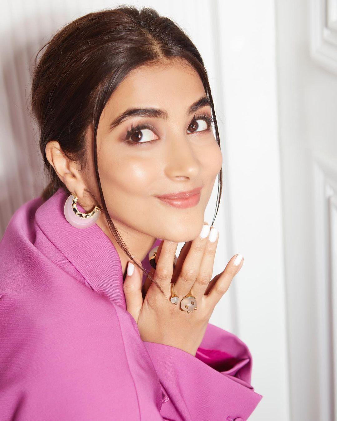 Pooja Hegde in Pink Outfit with a Charming Smile Pose