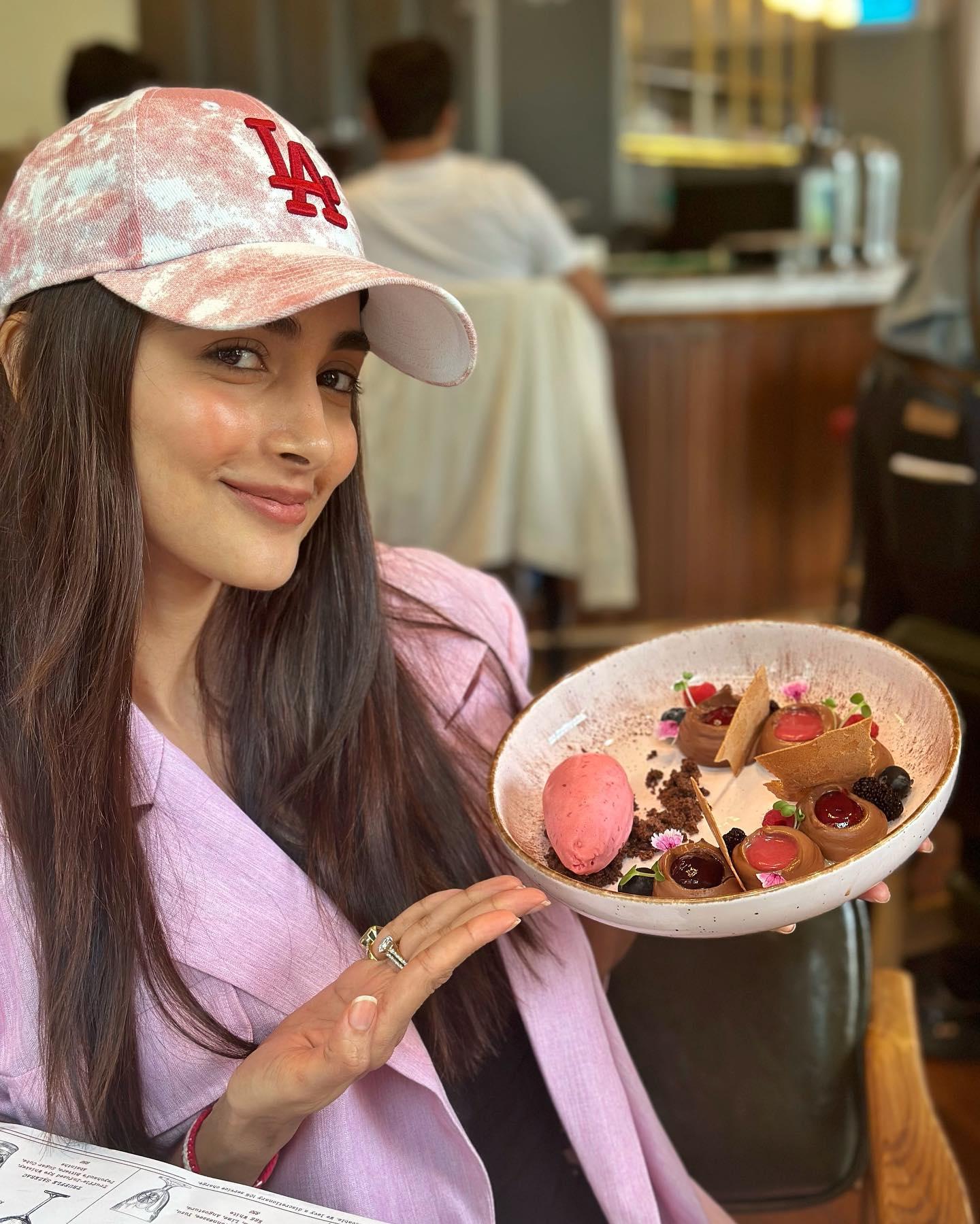 Pooja Hegde in Pink Outfit with a Dessert Bowl Wallpaper
