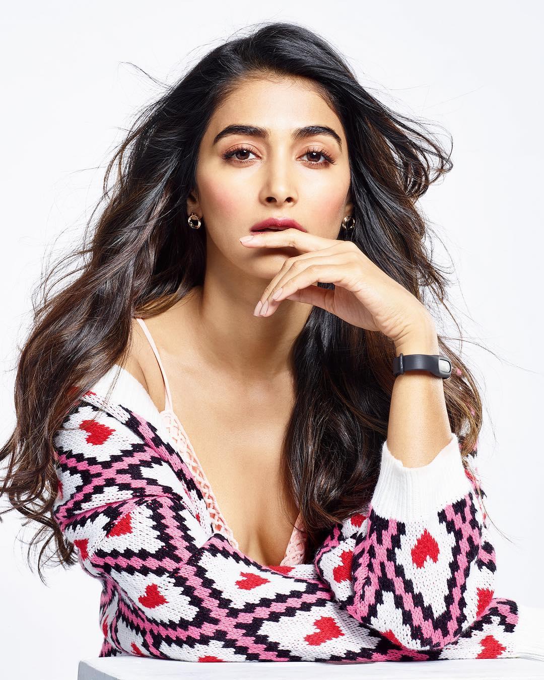 Pooja Hegde in Red and White Top with Serious Expression