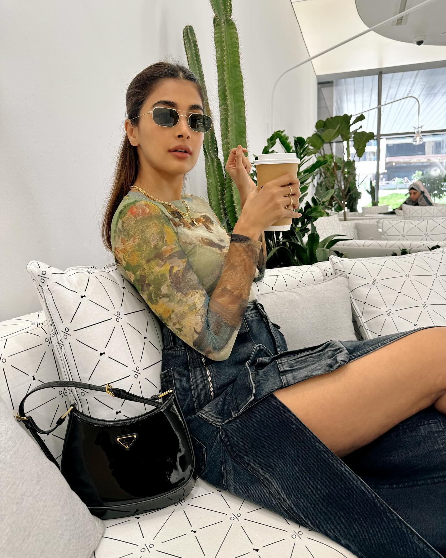 Pooja Hegde in Sheer Green Top and Denim Shorts Wallpaper