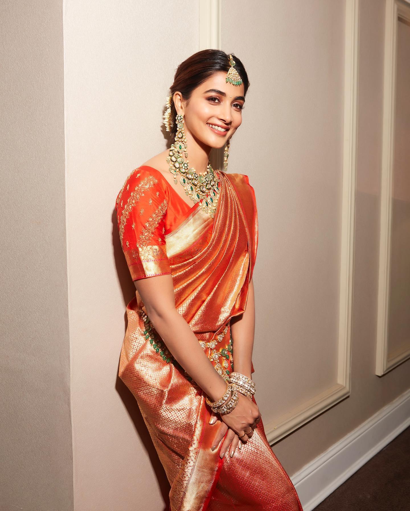 Pooja Hegde in Traditional Red Saree with Jewelry Image
