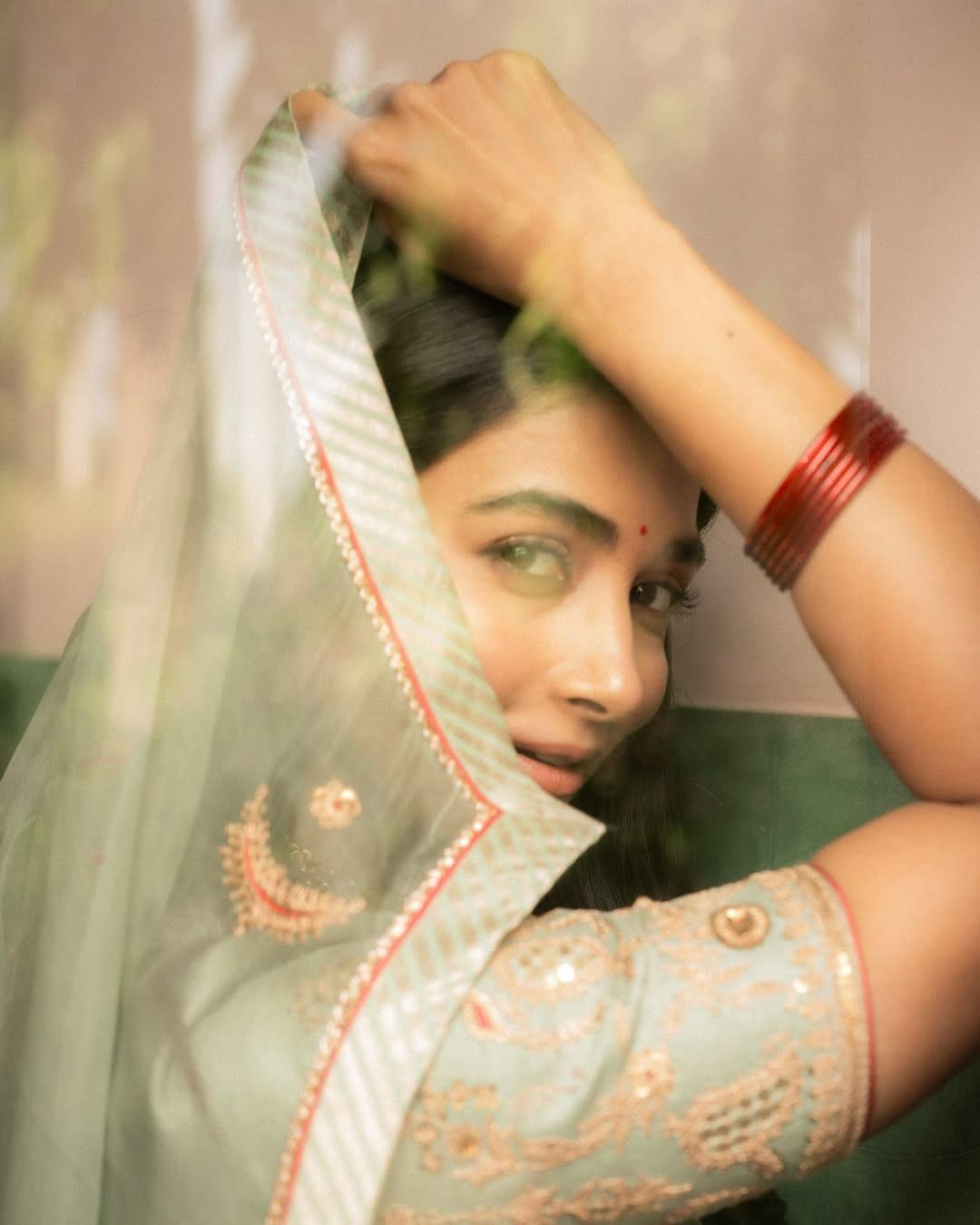 Pooja Hegde in Traditional Saree with Veil and Bangles