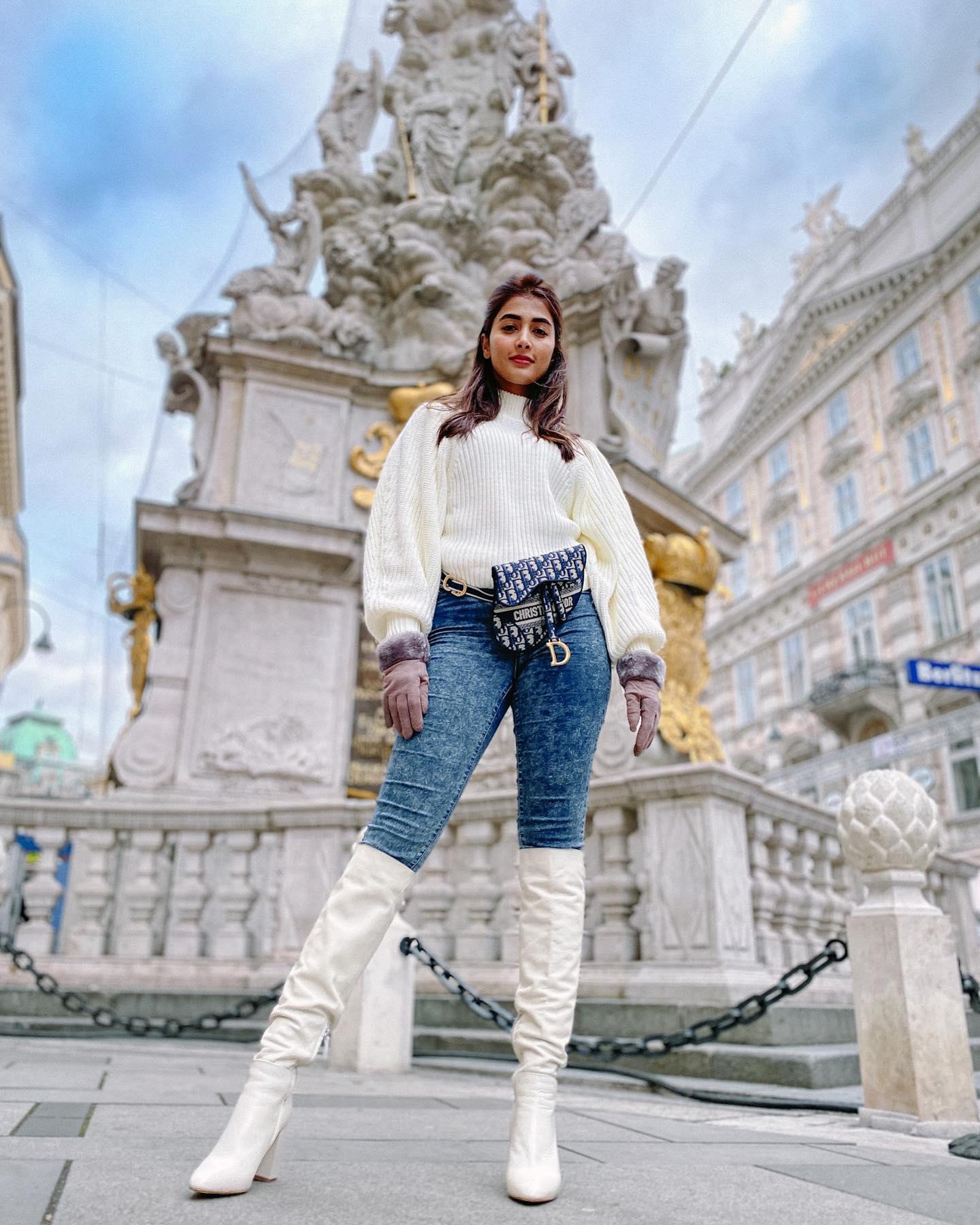 Pooja Hegde in White Boots Posing At a Historic Monument
