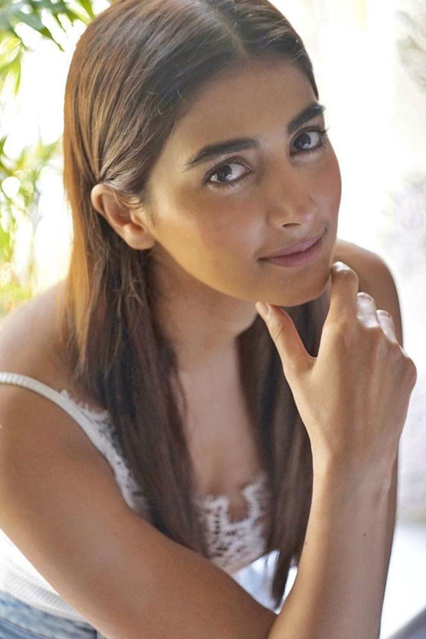 Pooja Hegde in White Lace Dress Under Natural Sunlight