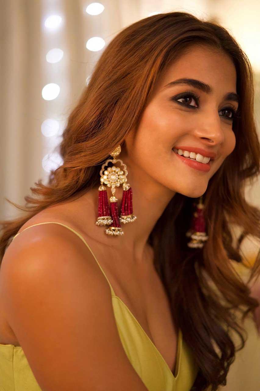 Pooja Hegde in Yellow Dress with Statement Earrings and Smile