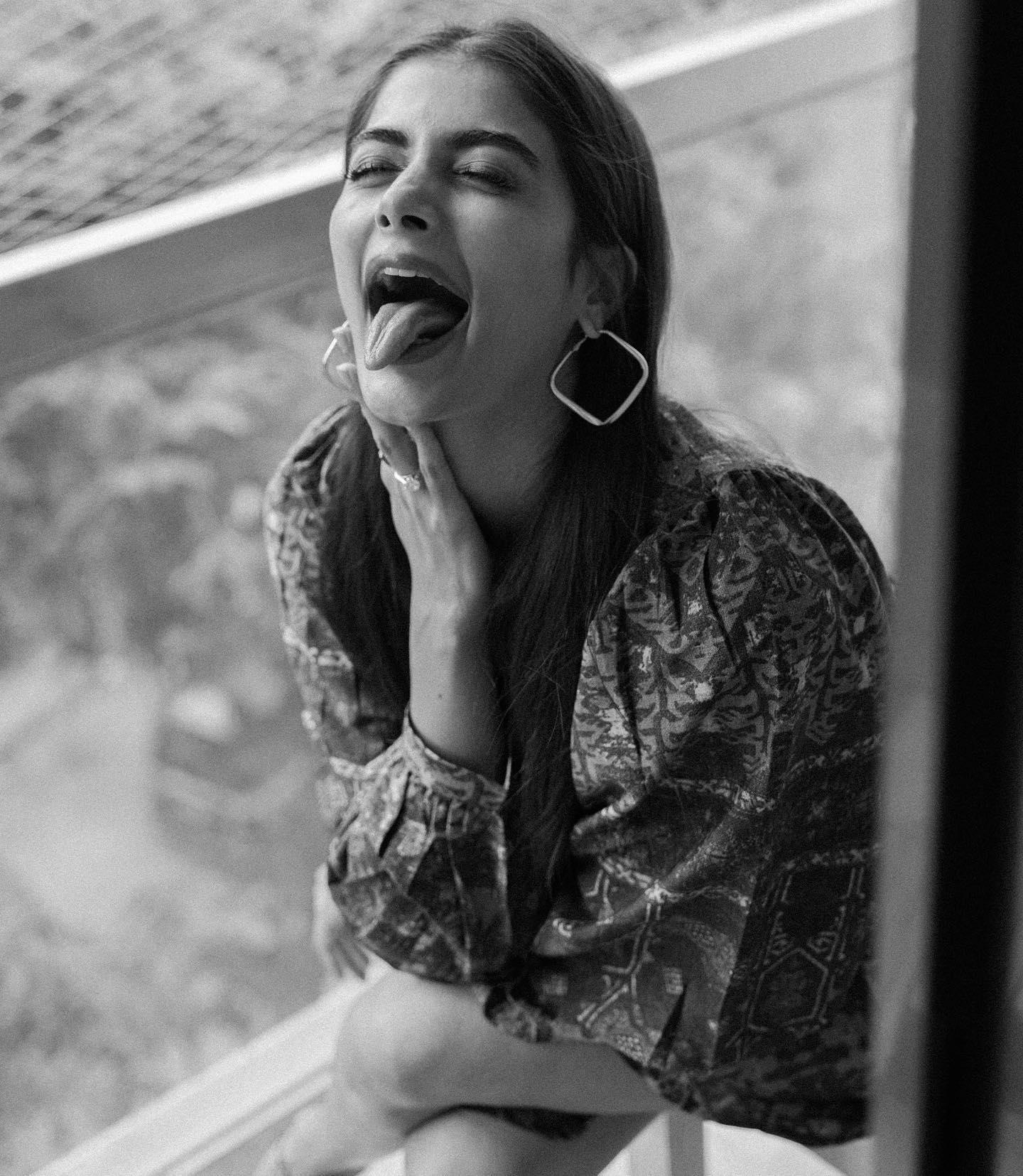 Pooja Hegde Laughing in Candid Black and White Moment