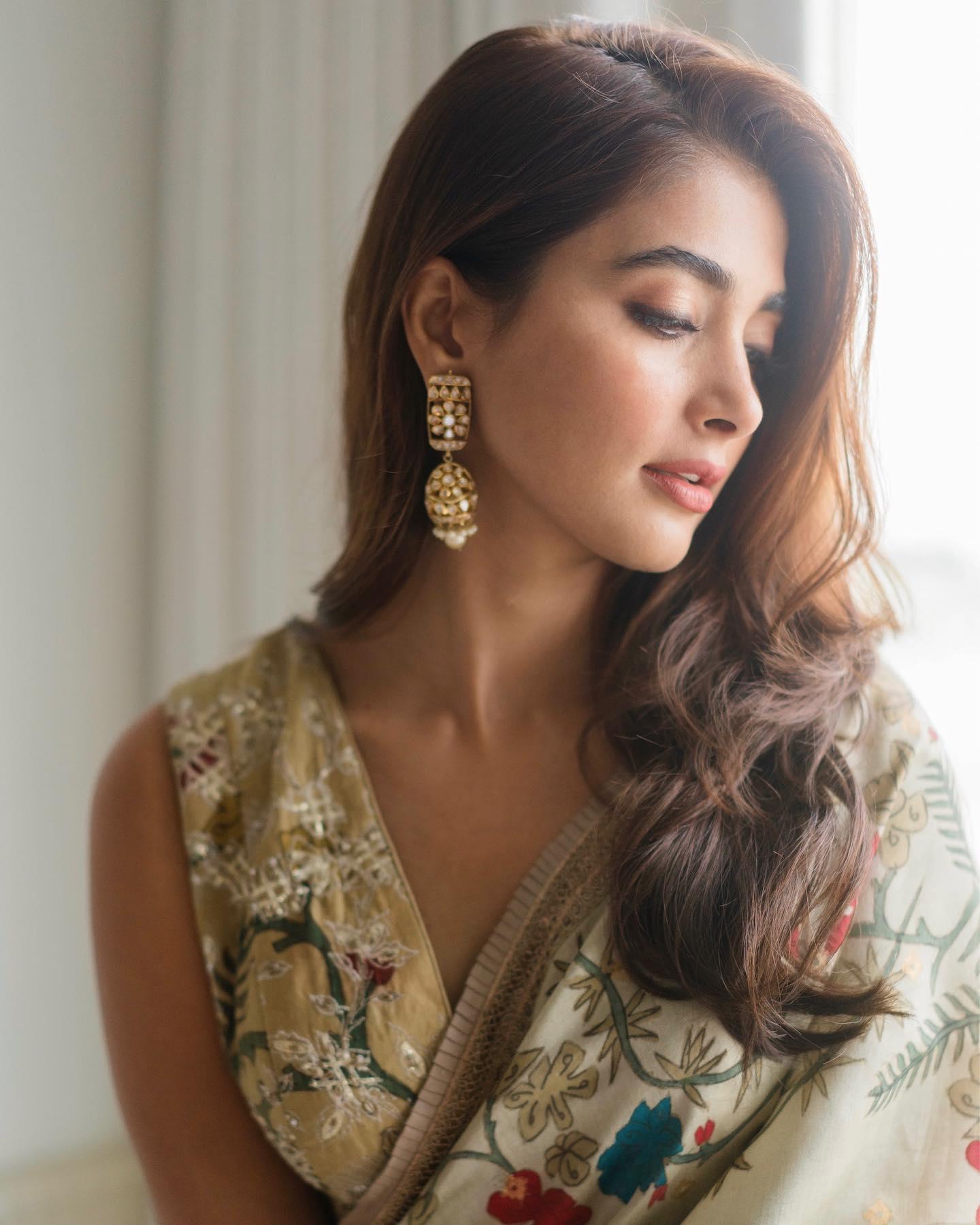 Pooja Hegde Looking Down Wearing Floral Traditional Dress