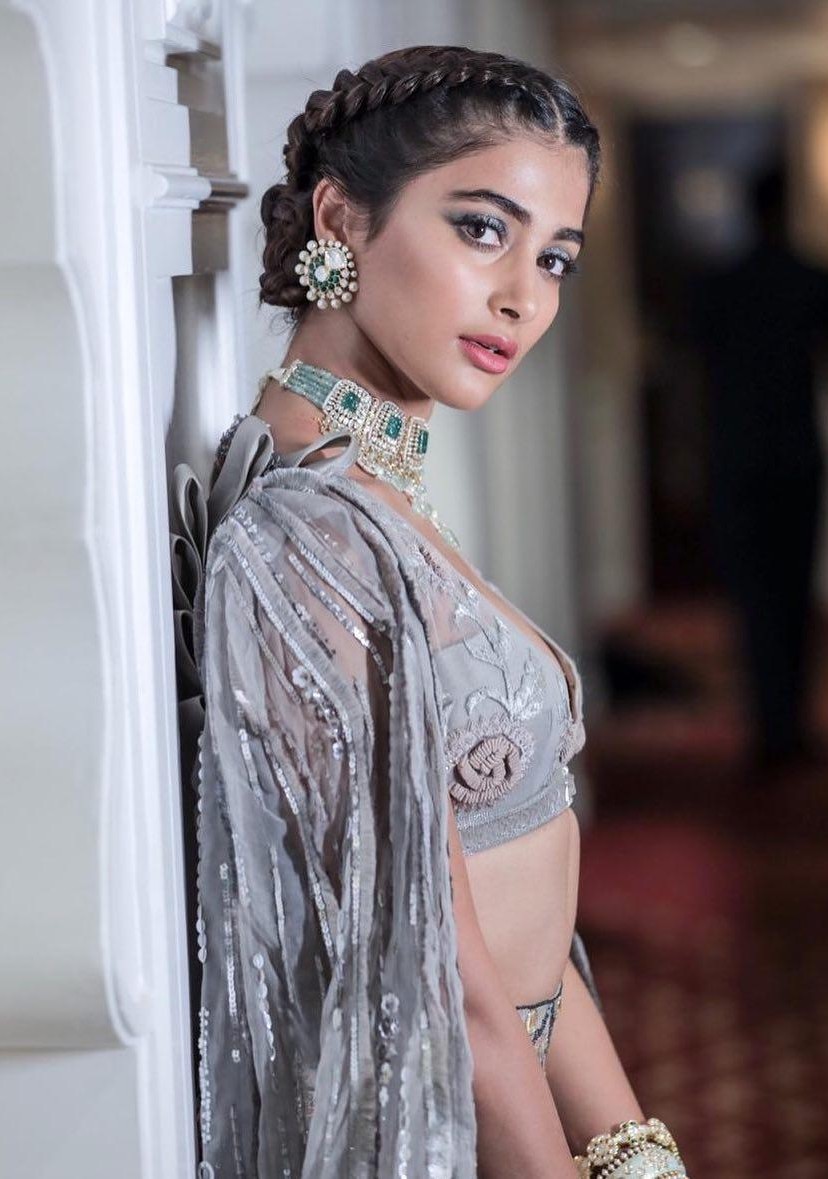 Pooja Hegde Looks Elegant in a Traditional Silver Saree