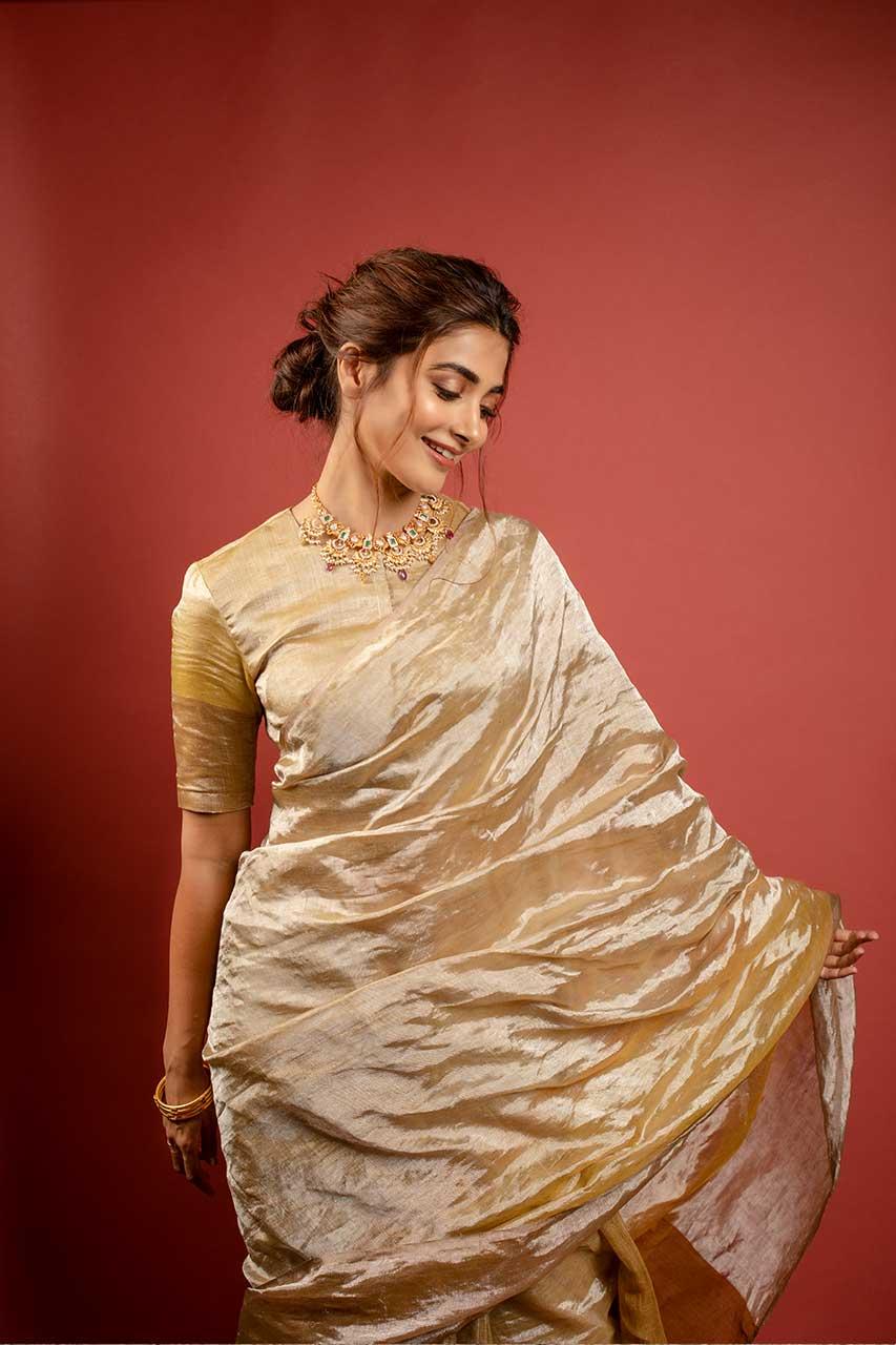 Pooja Hegde Looks Graceful in Golden Traditional Saree
