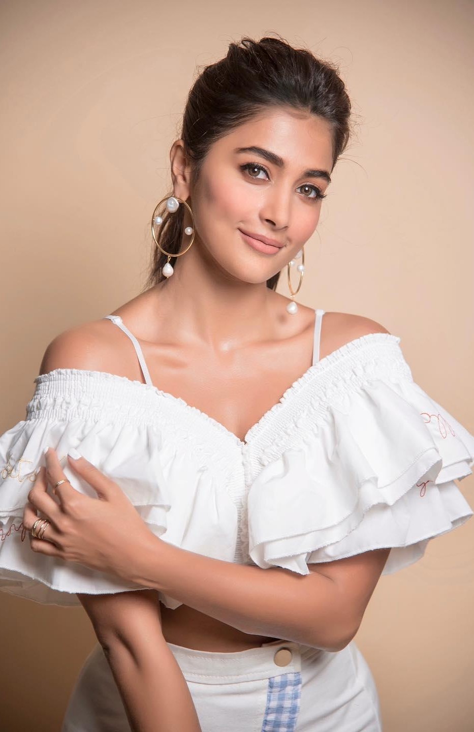 Pooja Hegde Looks Graceful in Off Shoulder White Dress