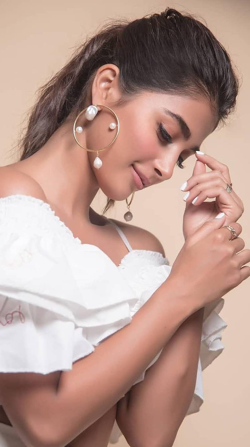 Pooja Hegde Looks Graceful in Off Shoulder White Outfit