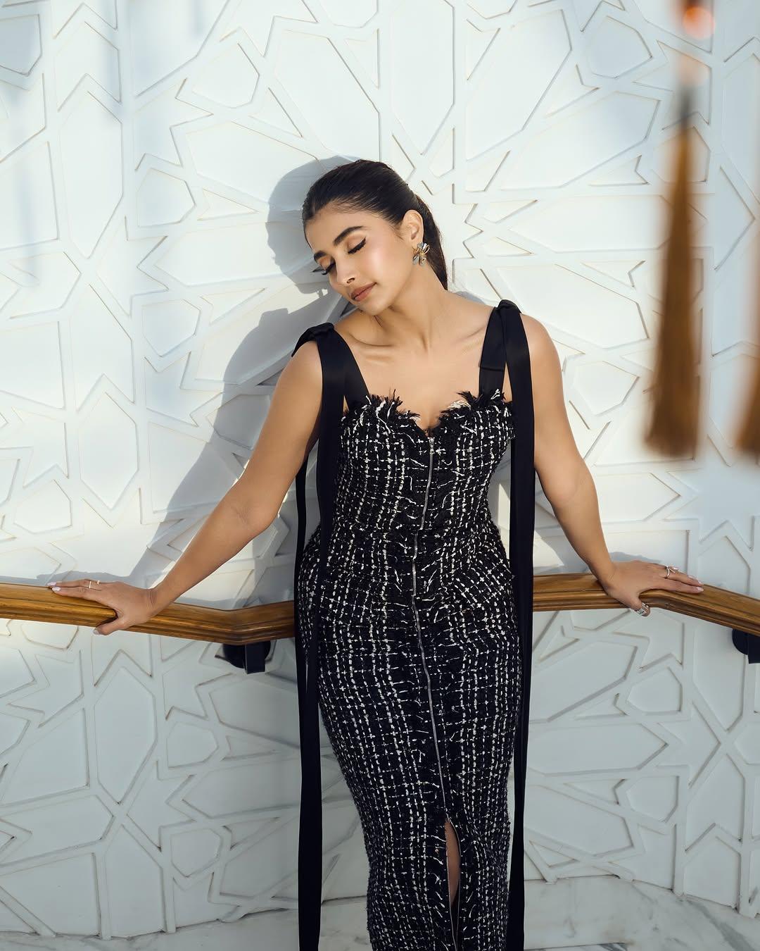 Pooja Hegde Posing Gracefully in Black Dress Wallpaper