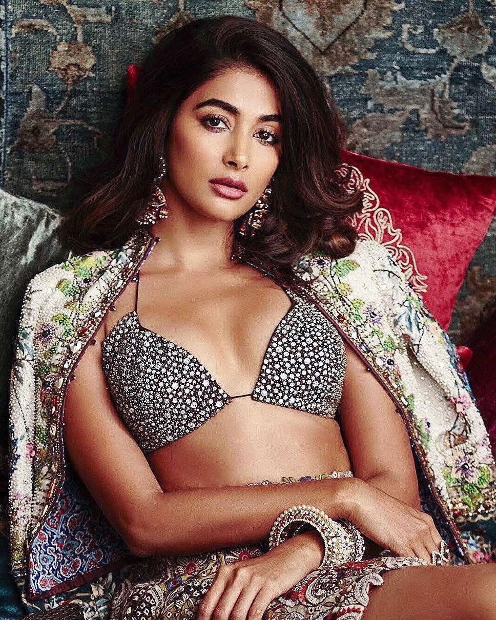 Pooja Hegde Relaxes in Printed Outfit on Velvet Bedding