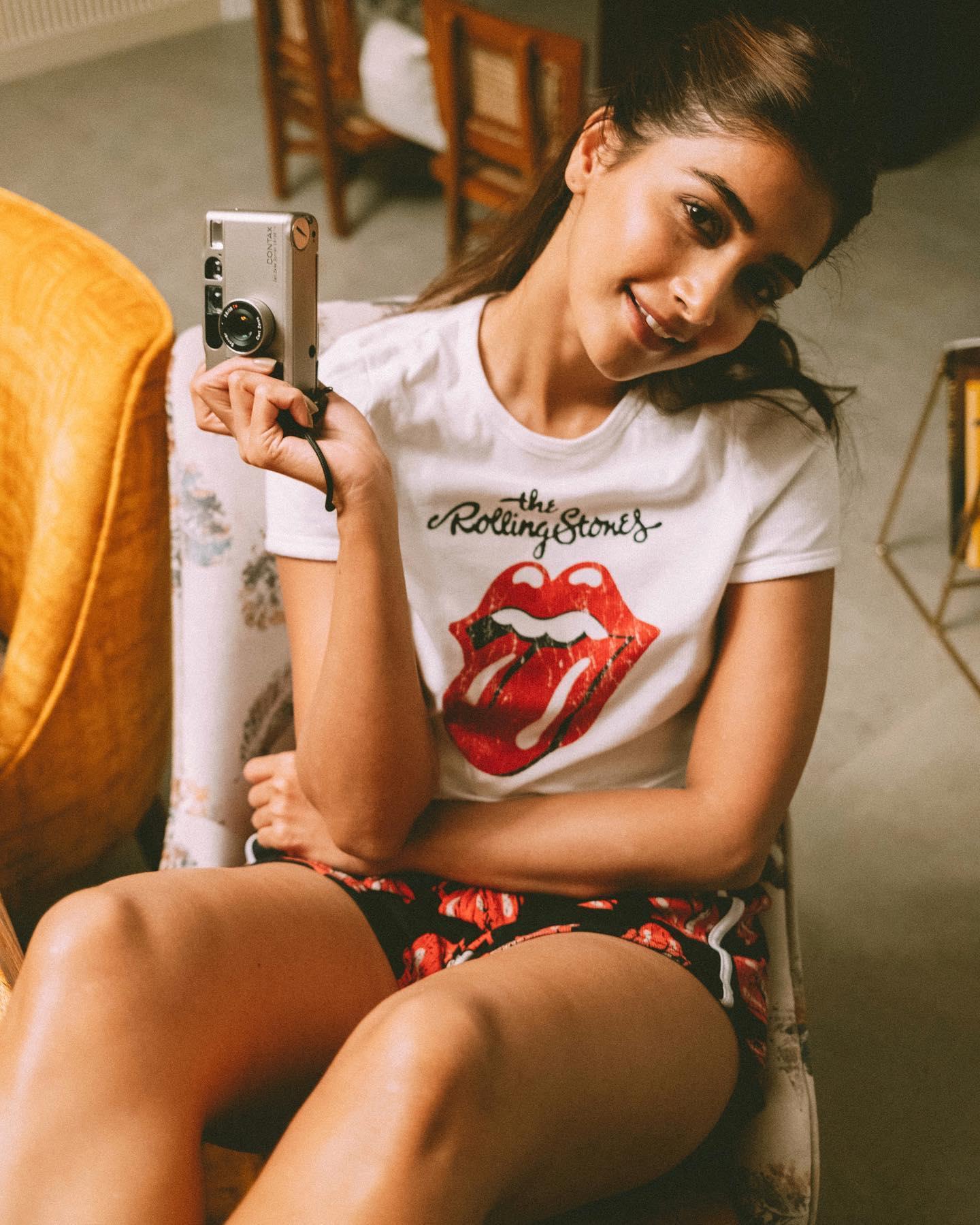 Pooja Hegde Relaxes Wearing Graphic Print T Shirt Wallpaper