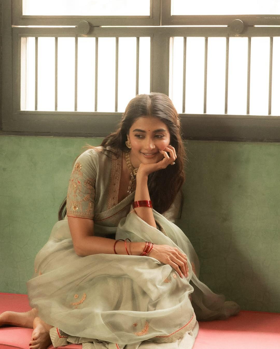 Pooja Hegde Relaxing in Traditional Dress Indoors Wallpaper
