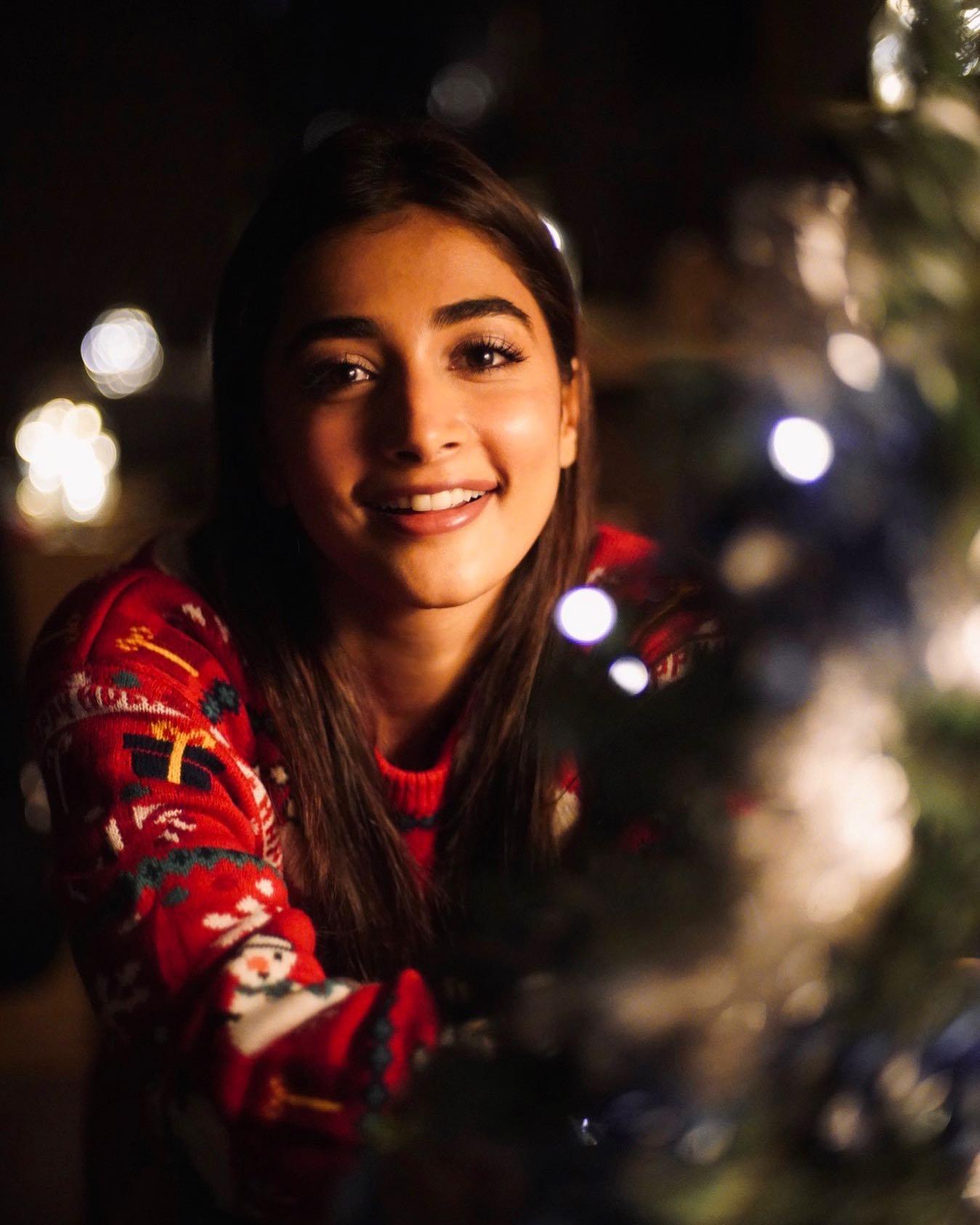 Pooja Hegde Smiles Brightly Near Festive Holiday Lights