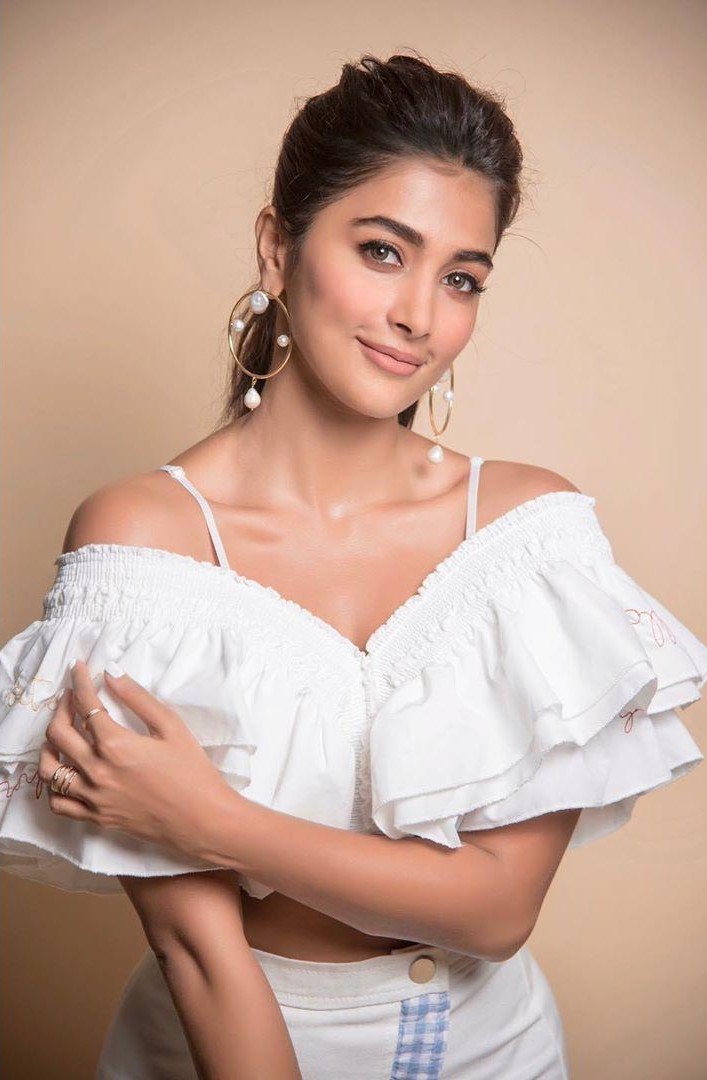 Pooja Hegde Smiles Softly Wearing An Off Shoulder Top