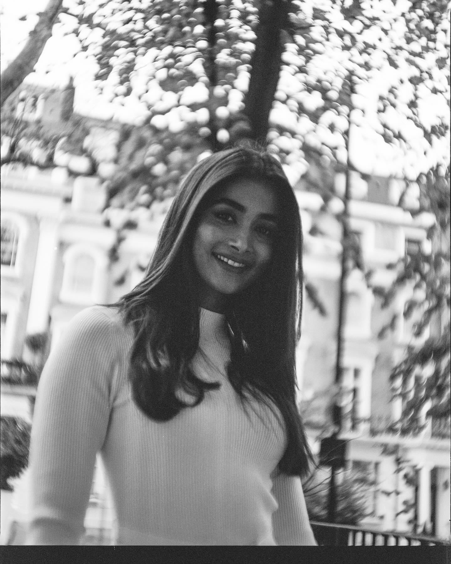 Pooja Hegde Smiling in Black and White Street Style Photo