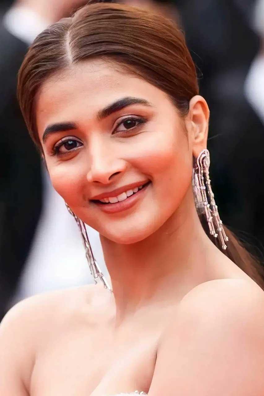 Pooja Hegde Smiling in White Dress At Celebrity Event