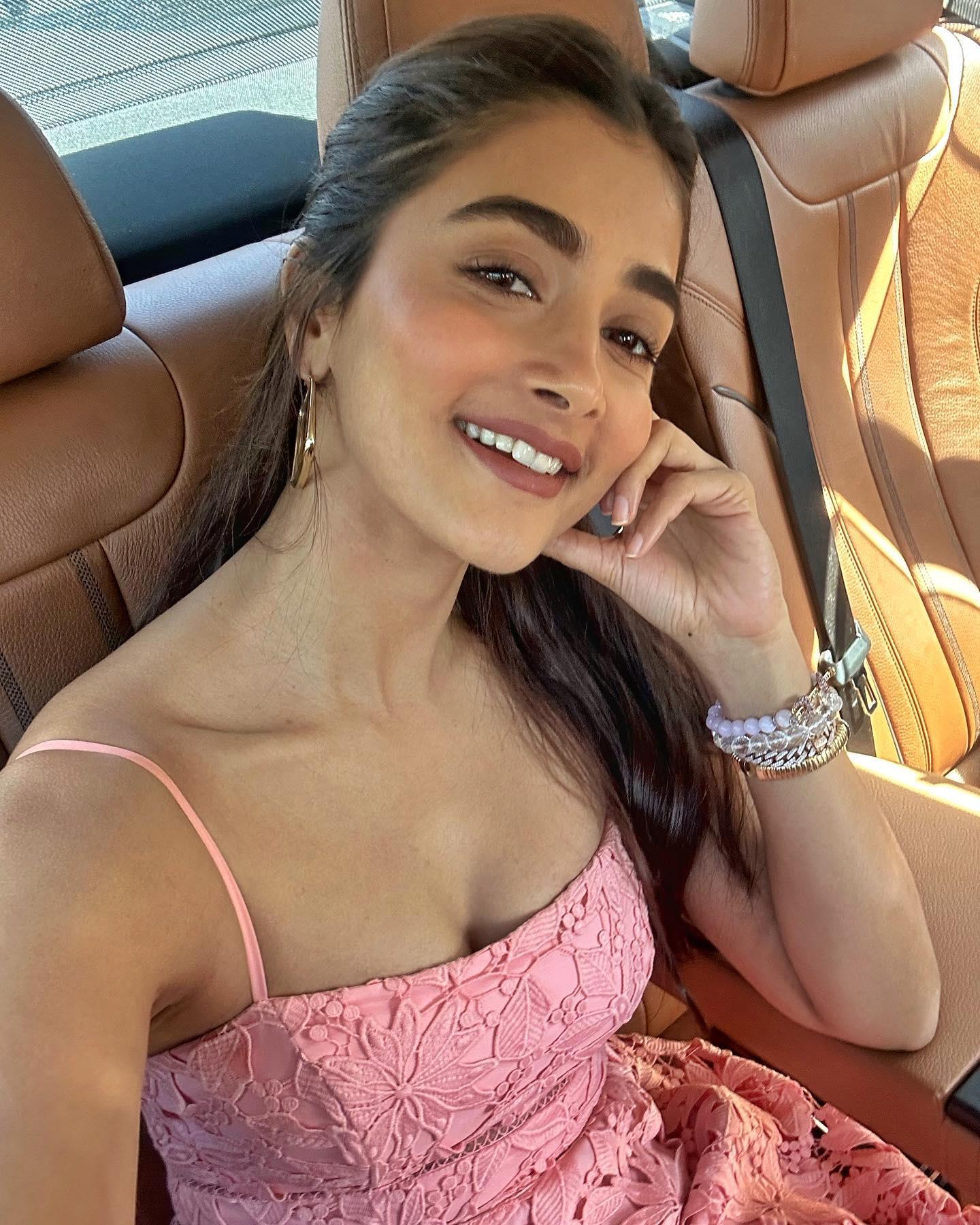 Pooja Hegde Takes Selfie in Pink Top From Car Seat Image