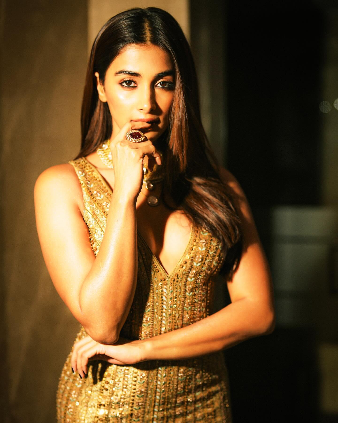 Pooja Hegde Thinking Deeply Wearing Golden Outfit Wallpaper