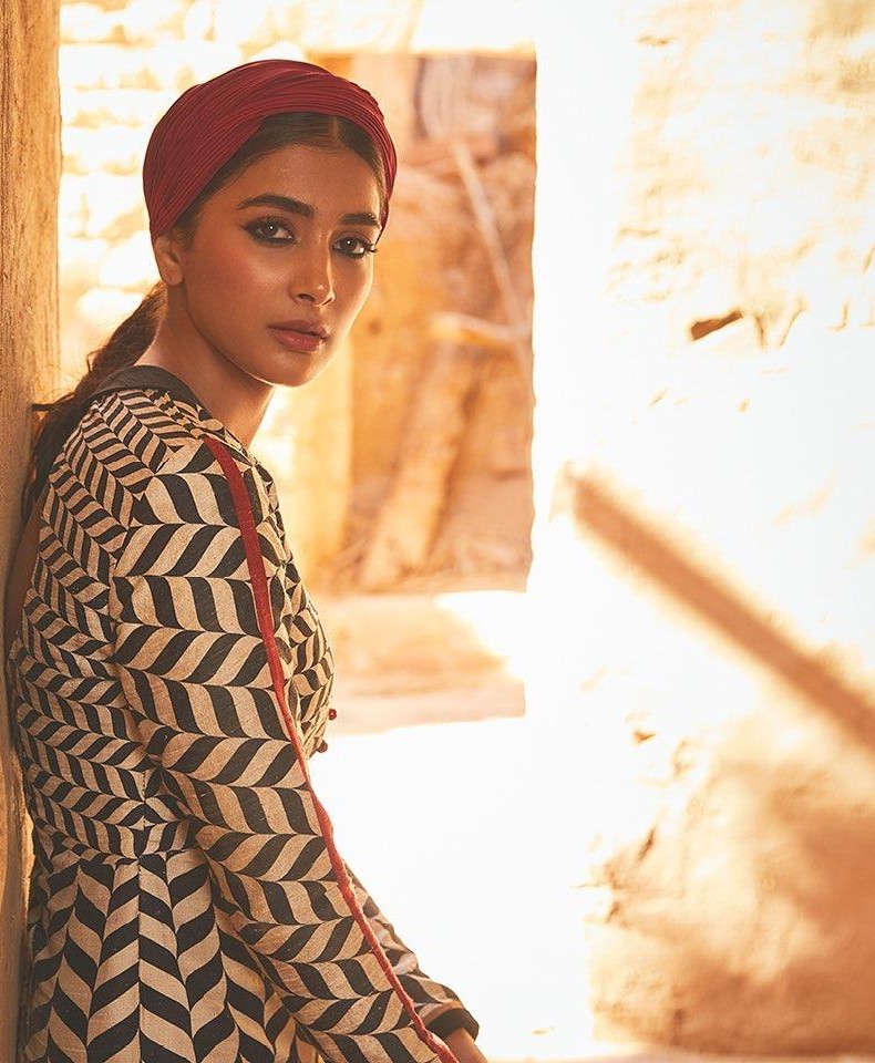 Pooja Hegde Wearing Printed Outfit in Warm Lighting Image