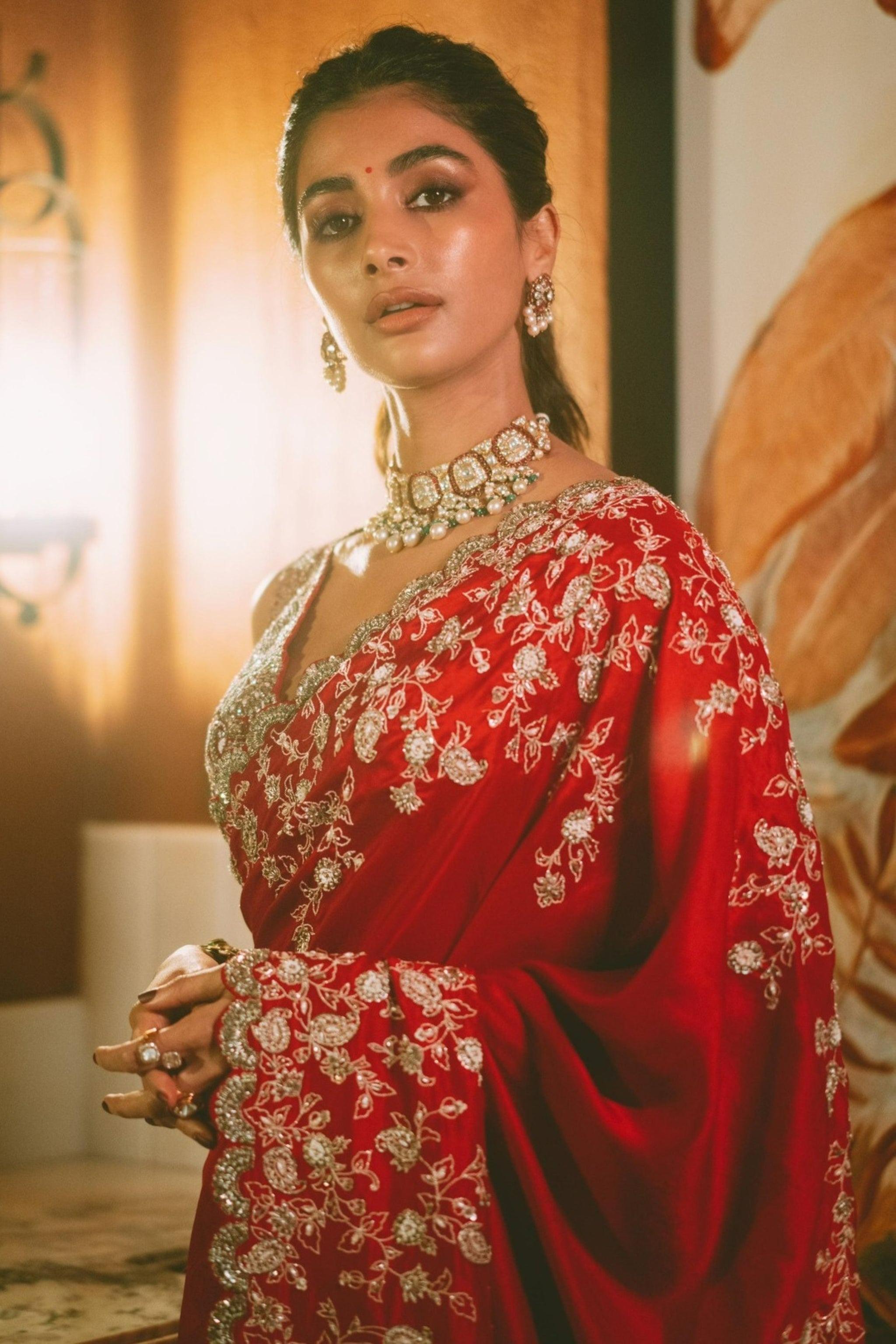 Pooja Hegde Wearing Red Saree with Heavy Necklace Indoors