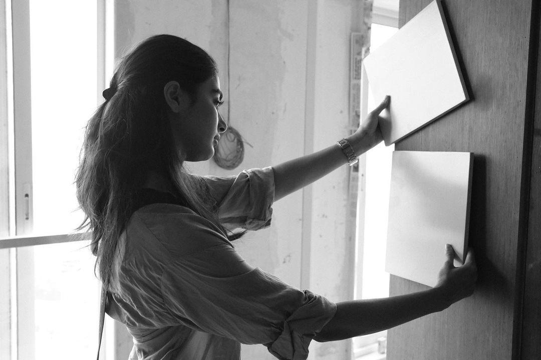 Pooja Hegde Working Near Window in Monochrome Artistic Shot