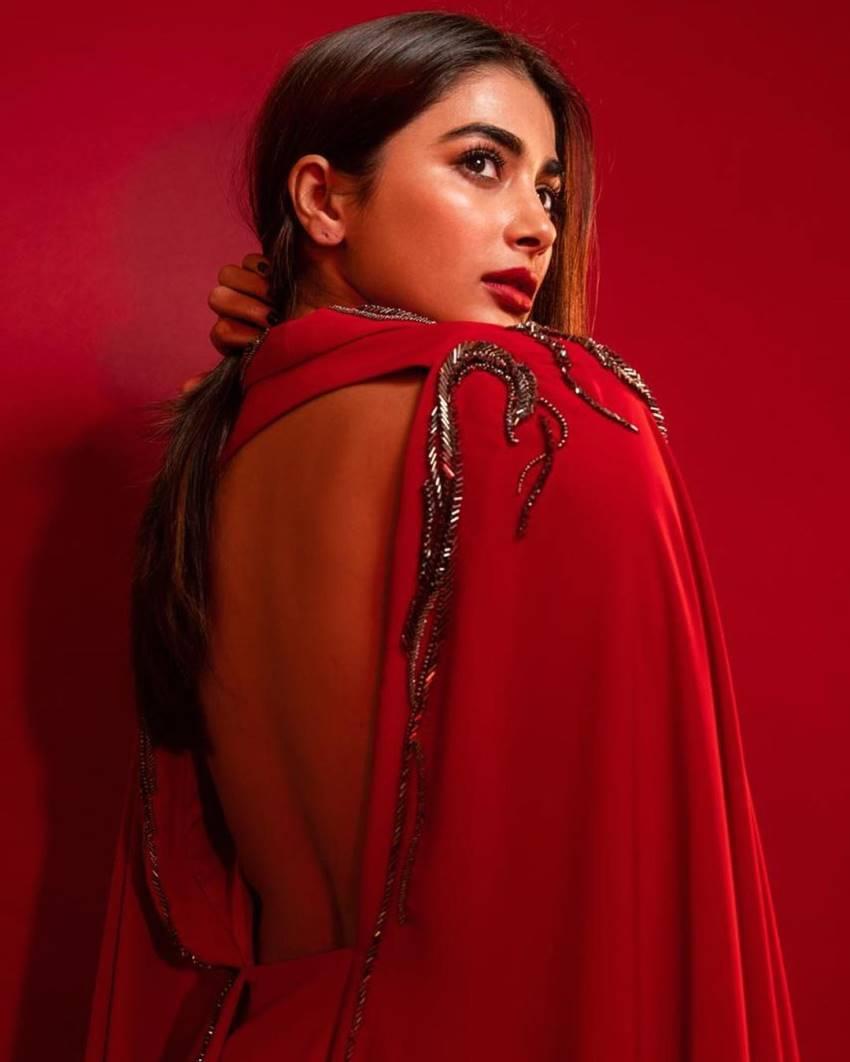 Striking Red Dress Look By Pooja Hegde with Intense Gaze