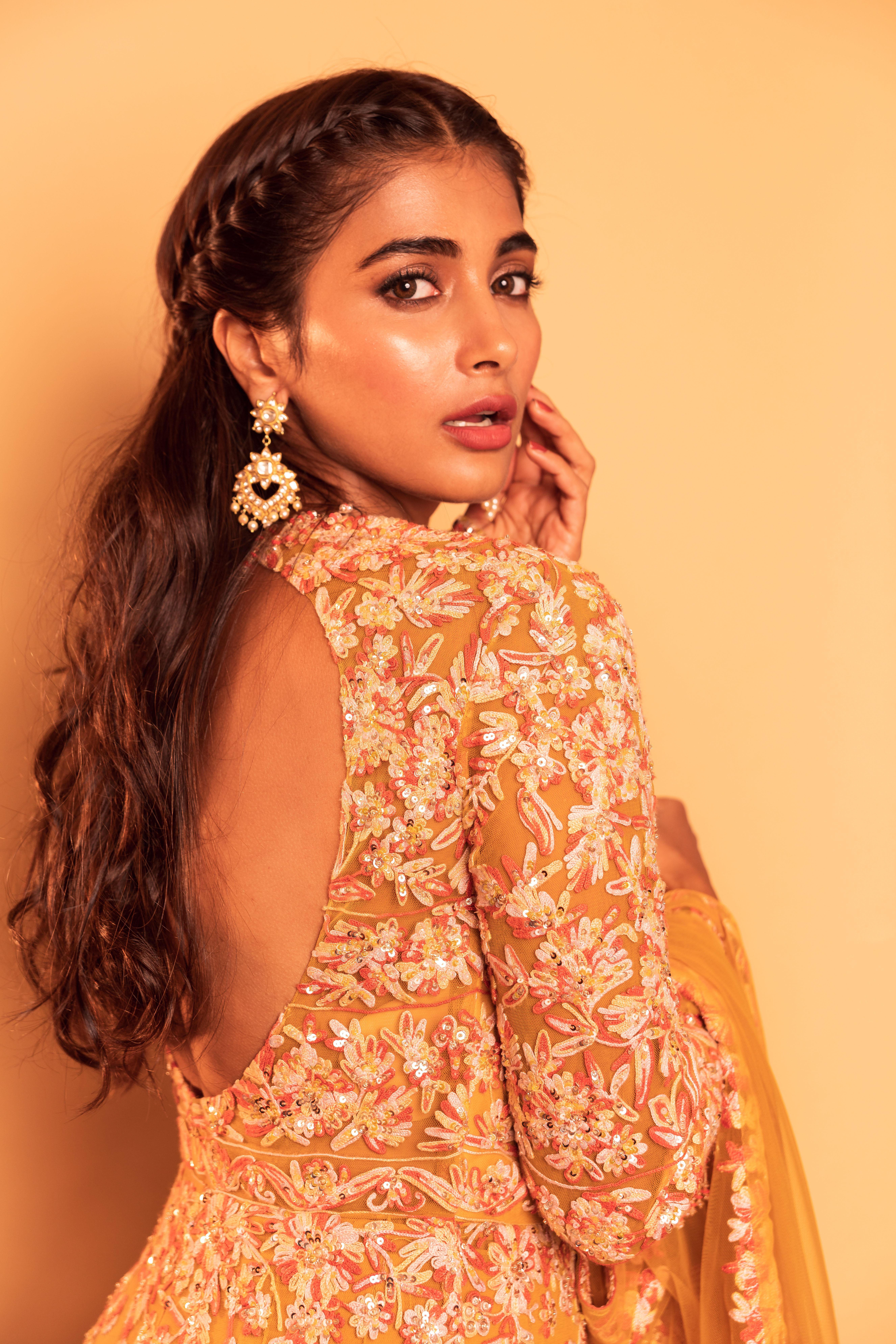 Stylish Pooja Hegde in Golden Designer Dress with Earrings