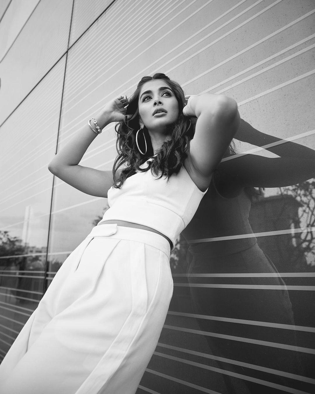 Stylish Pose of Pooja Hegde in White Dress Outdoors Image