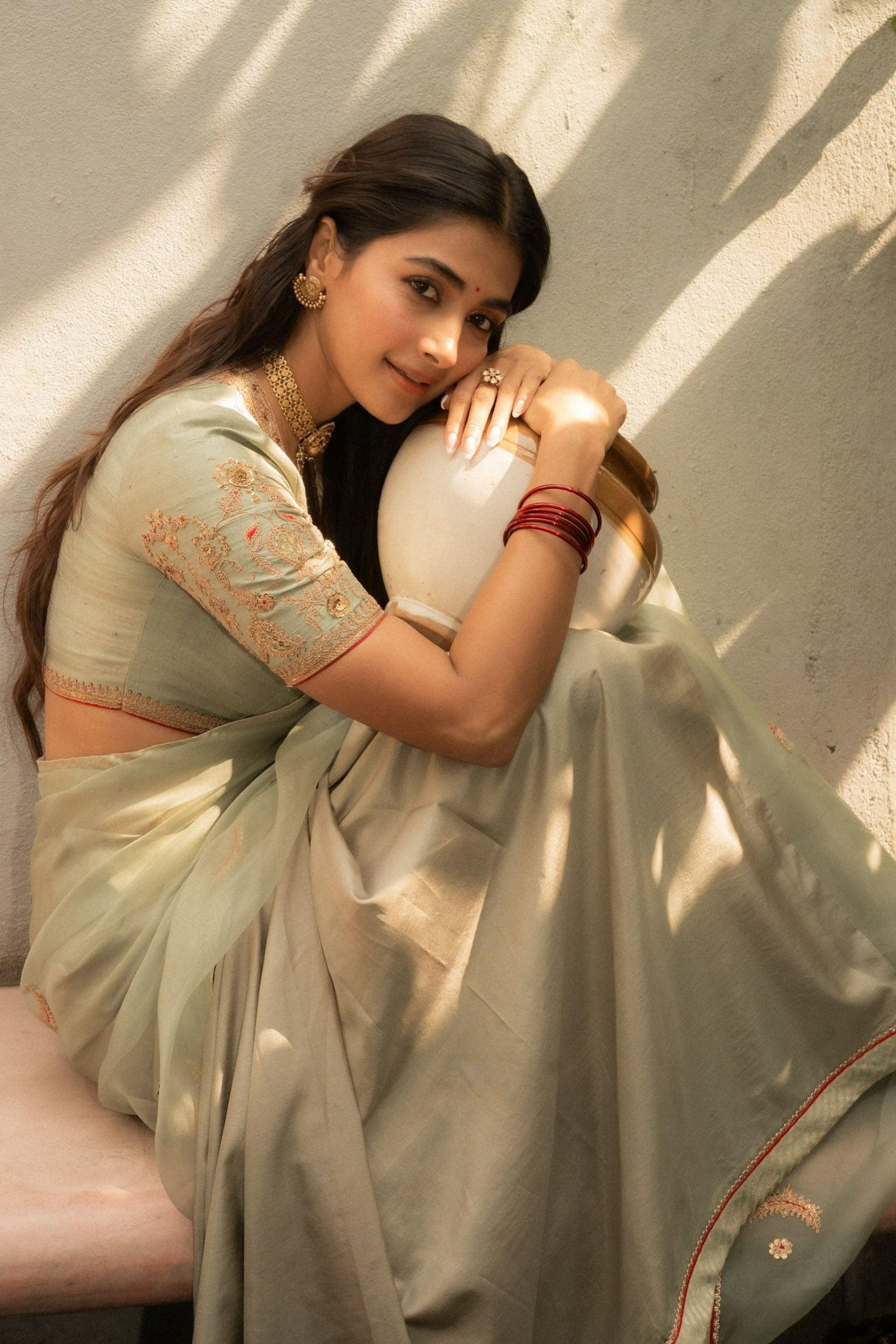 Traditional Pooja Hegde in Soft Green Saree Indoors Image