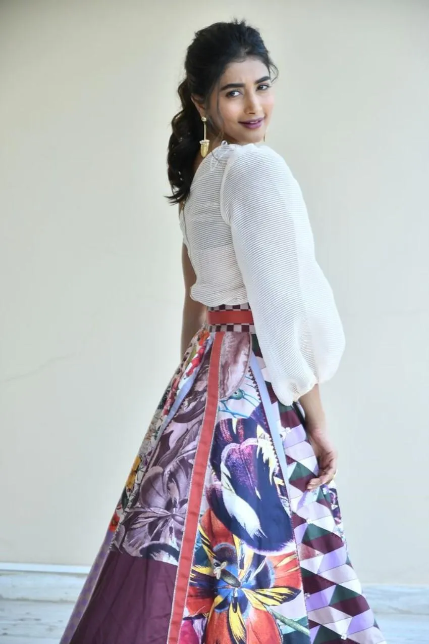 Back Turned Graceful Look of Pooja Hegde in Floral Outfit