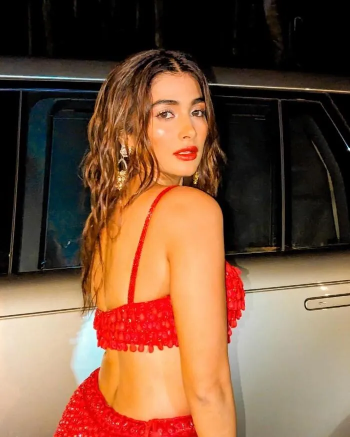 Bold and Confident Pooja Hegde in Red Backless Party Dress