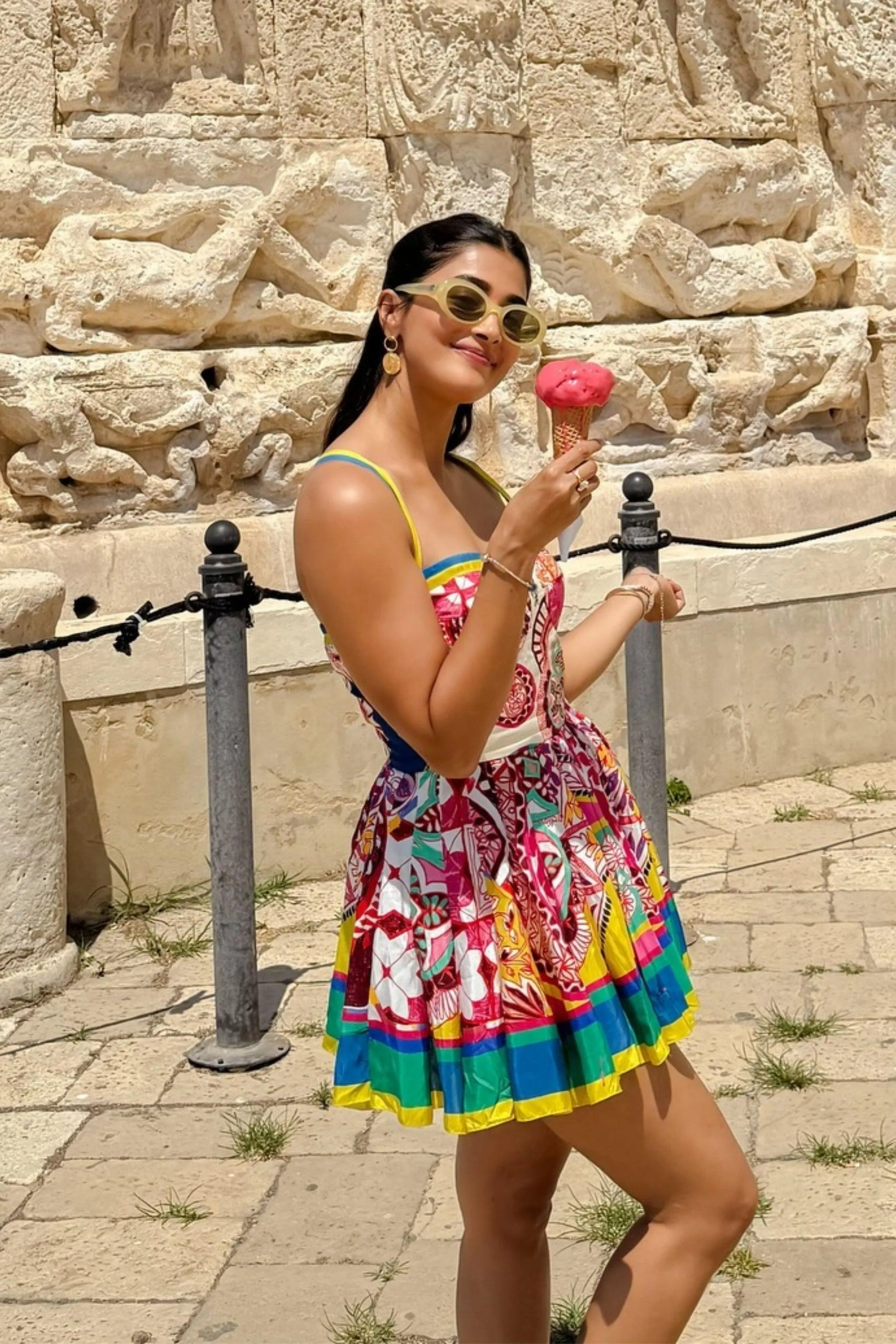 Cheerful Pooja Hegde in Colorful Dress Enjoying Ice Cream