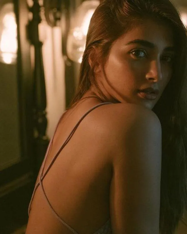 Cinematic Shot of Pooja Hegde in Backless Black Dress
