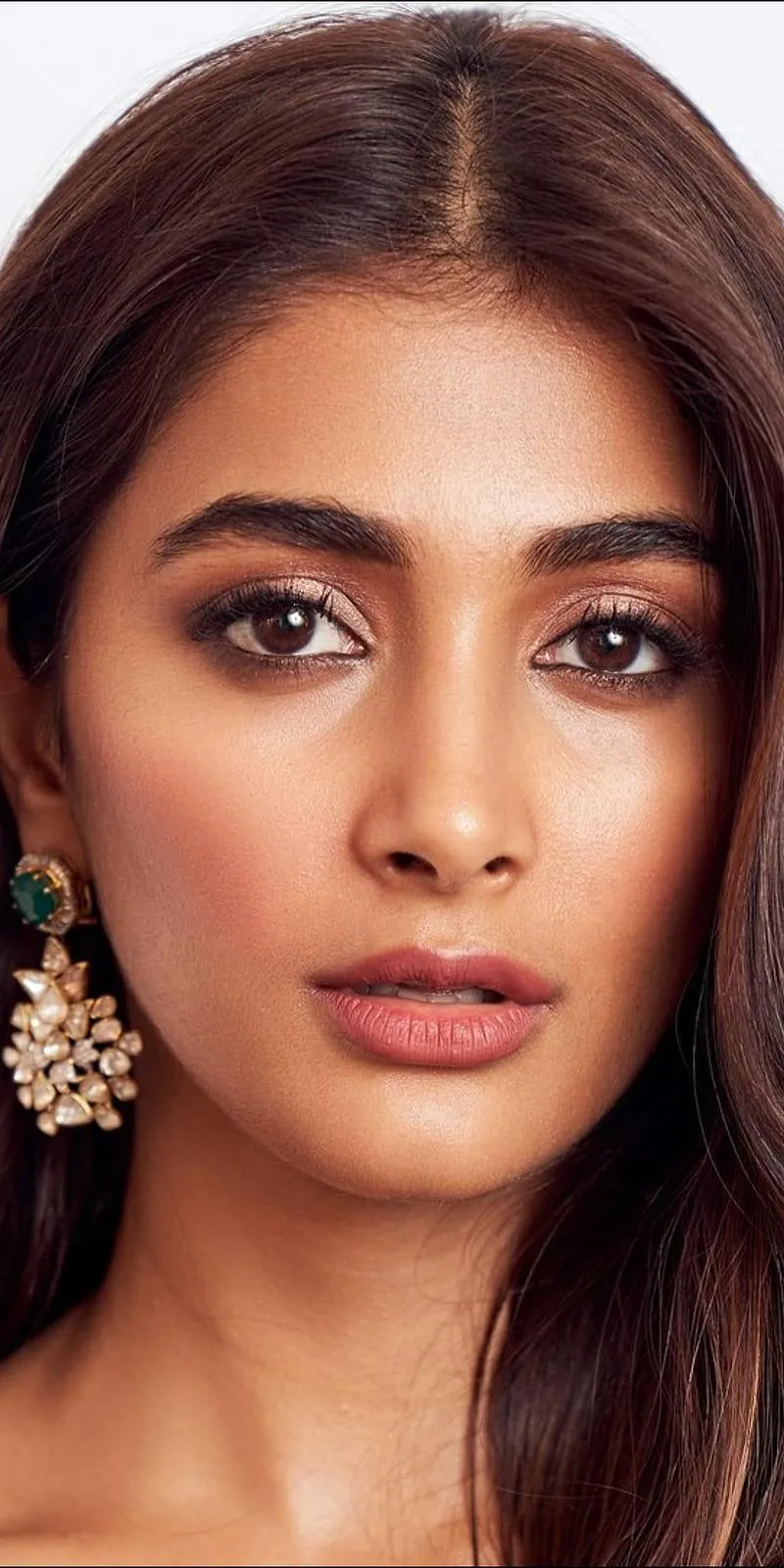 Close Up Portrait of Pooja Hegde with Earrings Image