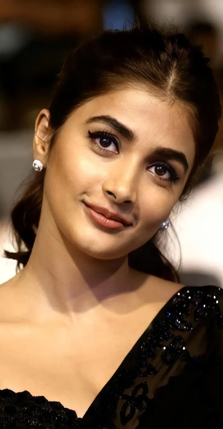 Elegant Closeup of Pooja Hegde in a Glamorous Black Outfit
