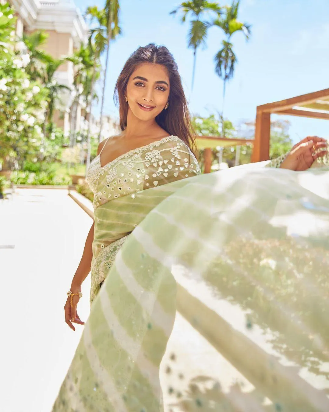 Elegant Pooja Hegde in Light Green Saree in Daylight