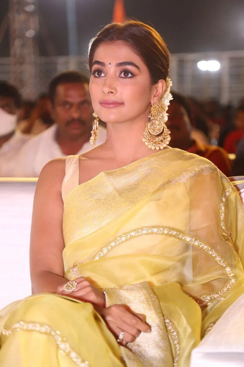 Elegant Pooja Hegde Wearing Traditional Yellow Saree