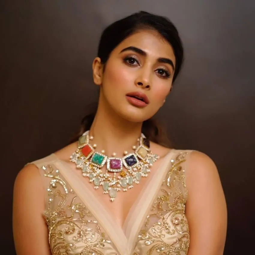 Ethnic Elegance of Pooja Hegde in Gold Embellished Blouse