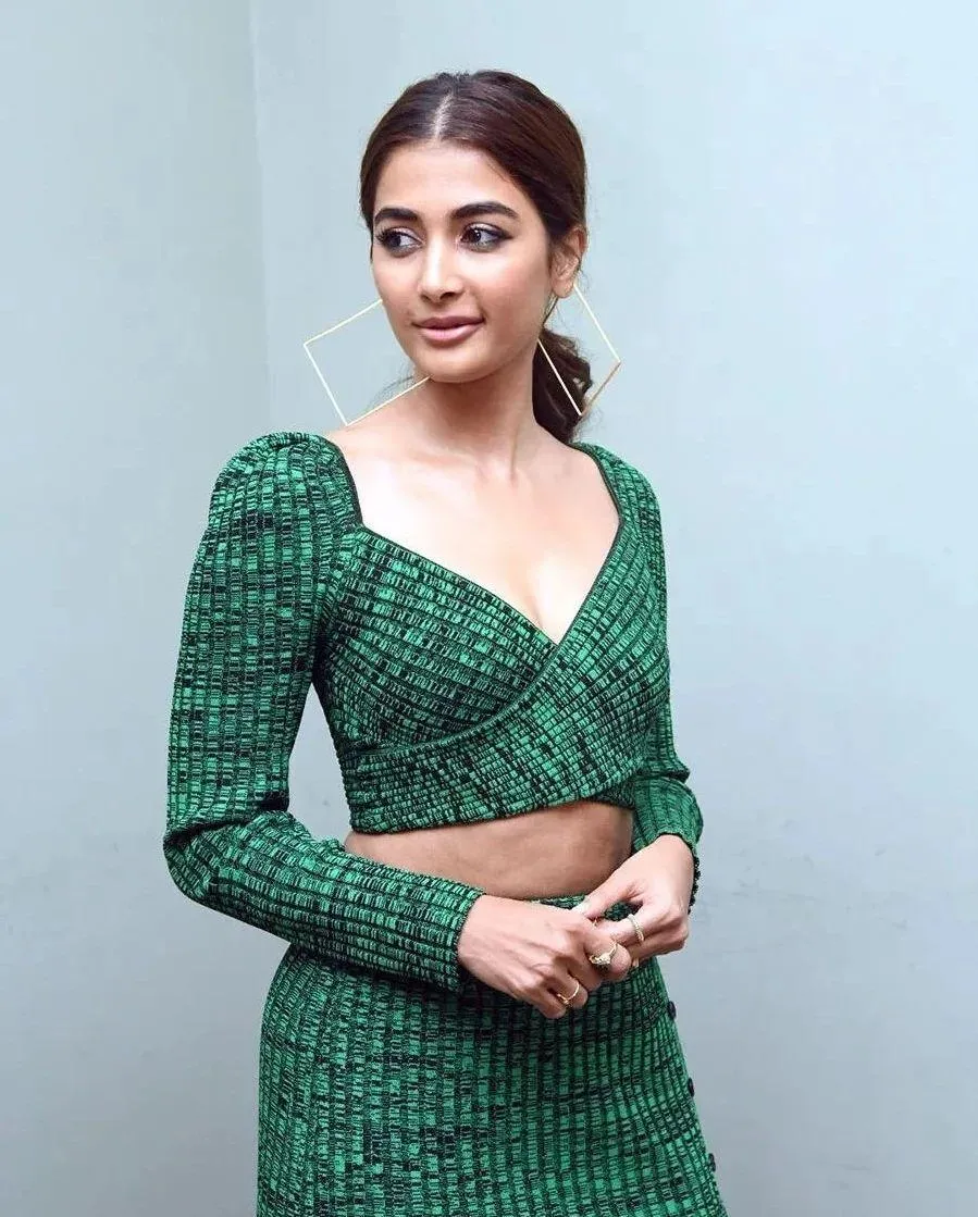 Fashionable Pooja Hegde in Green Textured Dress Posing